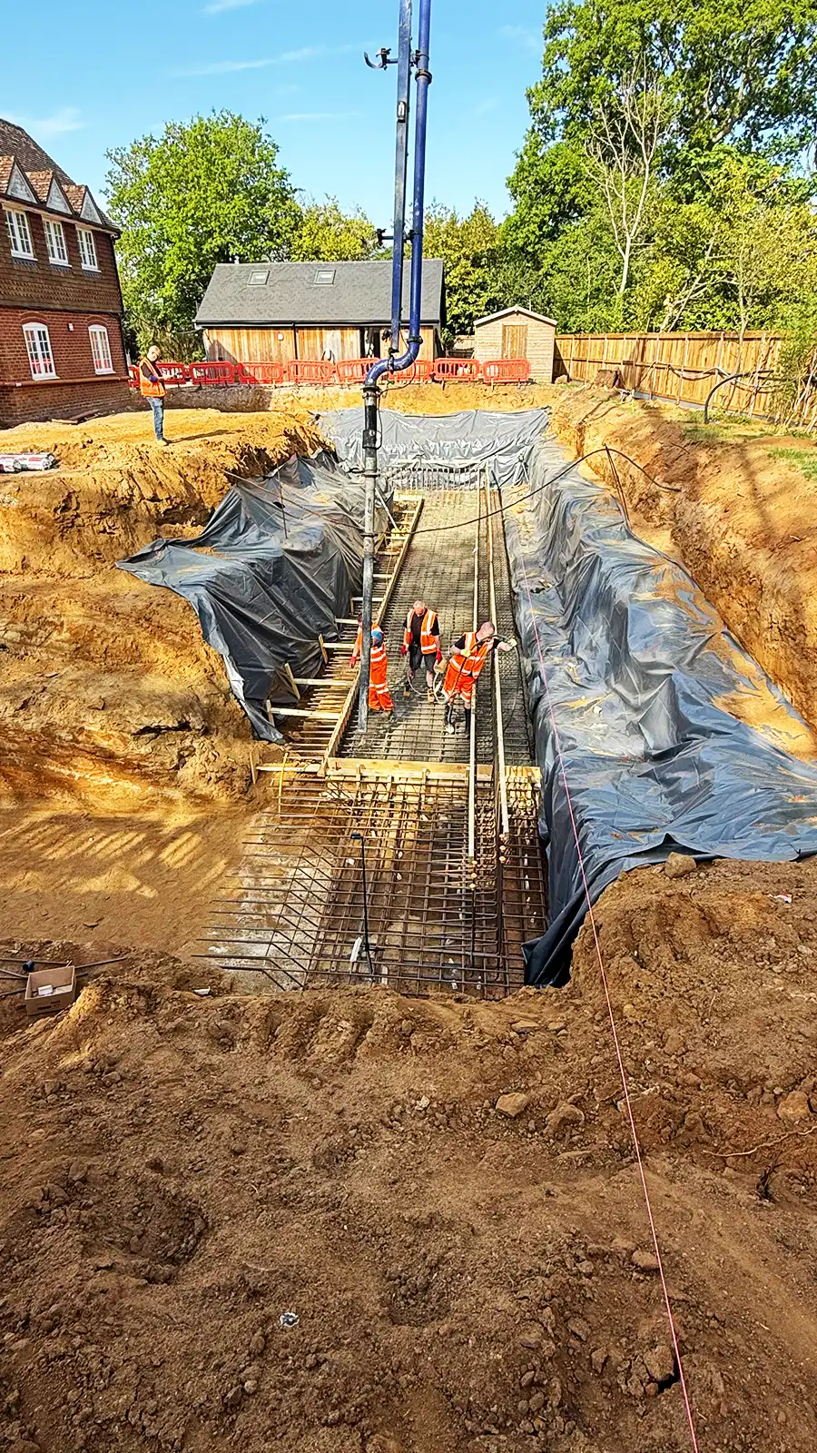 Luxury London basement with pool, gym, cinema room and wine cellar built by Basement Structures with integrated waterproofing, structure and ventilation systems